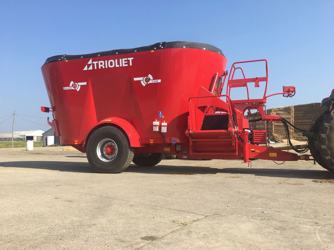 Cows-are-fed-by-a-mixer-feeder-or-feed-mixer-wagon